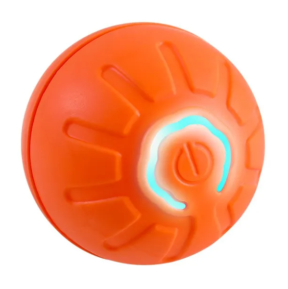 Interactive dog ball toy in orange with teal textured grip detail - close-up product shot