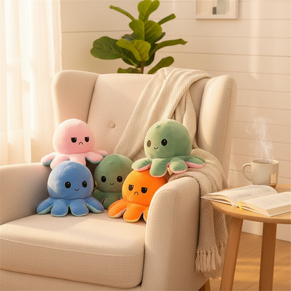 Plush octopus toys on a chair: pink, green, blue, and orange with stitched eyes