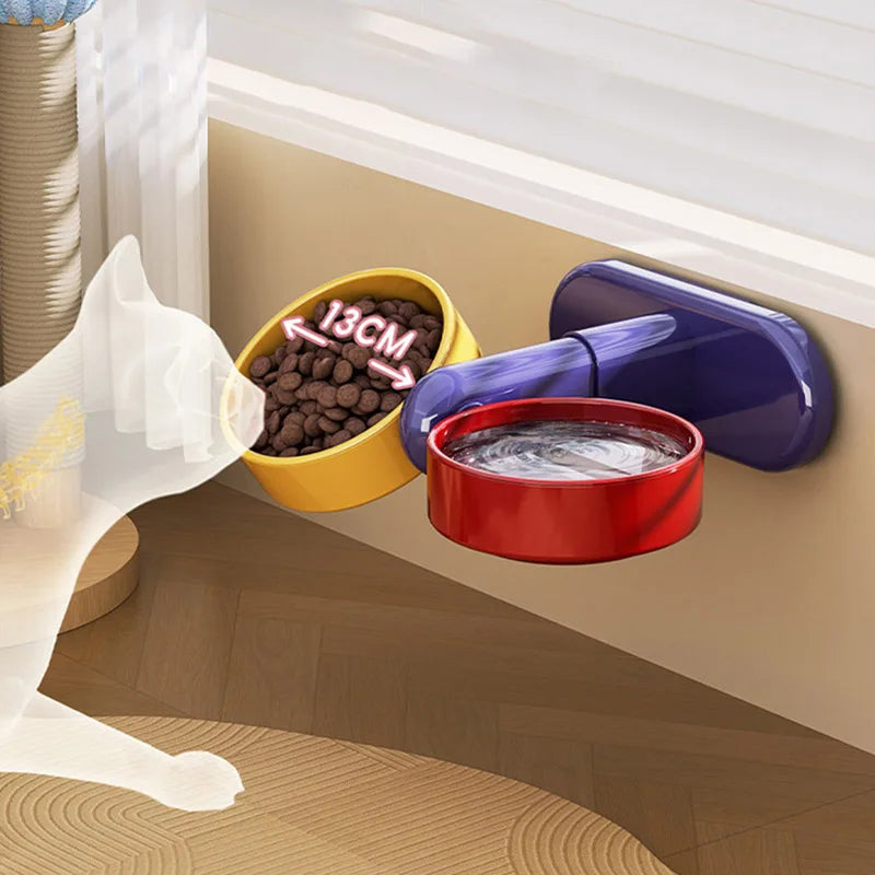 Close-up top-down view of elevated double bowl pet feeder showing 13cm bowl size with food and water