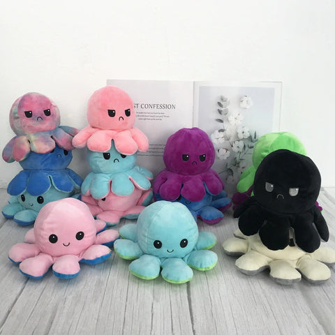 Plush octopus toys in multiple colors, including black, pink, green, blue, and purple
