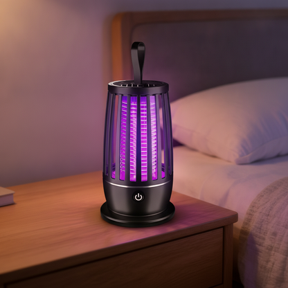 Insect zapper on a nightstand with a bed in the background